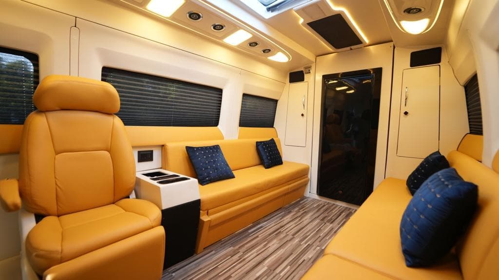 Caravan with recliner lounge seating interior